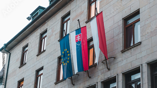 European and Slovak flags on a building in Bratislava