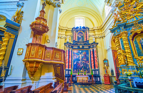 Richly decorated interior of St. Bernard of Siena Church in Krak photo