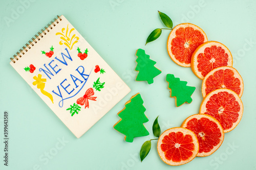 top view tasty fresh grapefruits juicy fruit slices on light-blue background fruit diet color fresh juice new year