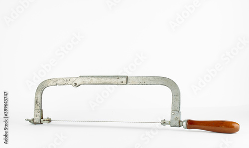 Vintage rusty coping saw for woodworking