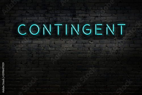Neon sign. Word contingent against brick wall. Night view photo
