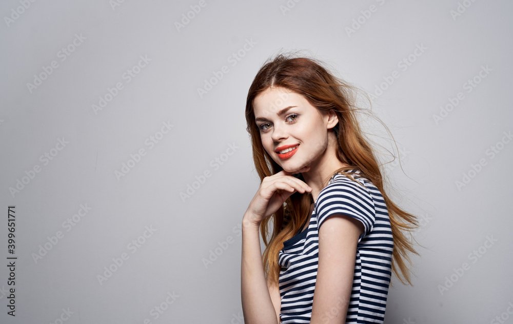 Pretty woman striped t-shirt decoration cosmetics glamor emotions attractive look Pretty woman striped t-shirt decoration cosmetics glamor emotions attractive look