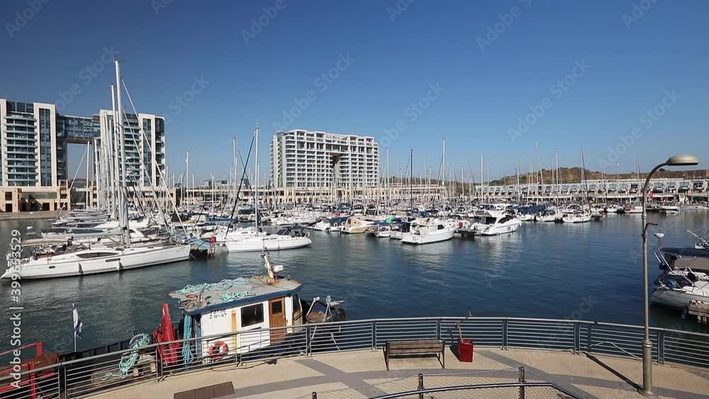 Yachts are moored in Herzliya. Anchorage for yachts. The yachts sway on the waves. Yachts are moored in Herzliya. Anchorage for yachts. The yachts sway on the waves.