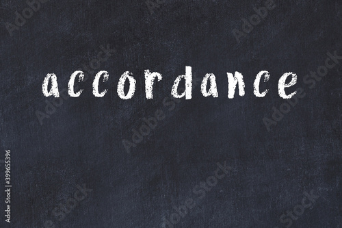 Foto College chalk desk with the word accordance written on in