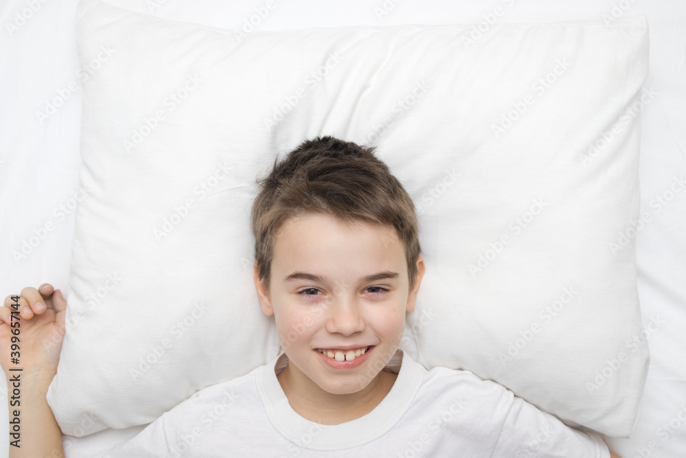 white pillow mock up with smiling boy white pillow mock up with smiling boy