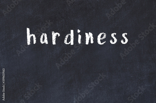 Billede på lærred College chalk desk with the word hardiness written on in