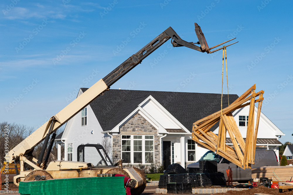 raising the rafters with a crane Stock Photo | Adobe Stock