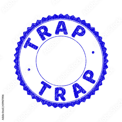 Grunge TRAP round rosette stamp. Empty space inside circle. Vector blue rubber overlay of TRAP label inside round rosette. Stamp seal with scratched texture. Seal with grunge texture in blue color.