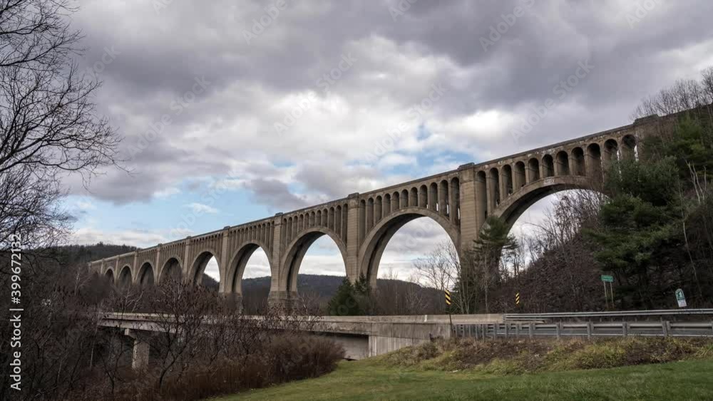The Tunkhannaock Creek Viaduct in Nicholson, Pennsylvania built by the Lackawanna Railroad under a cloudy fall sky. The Tunkhannaock Creek Viaduct in Nicholson, Pennsylvania built by the Lackawanna Railroad under a cloudy fall sky.