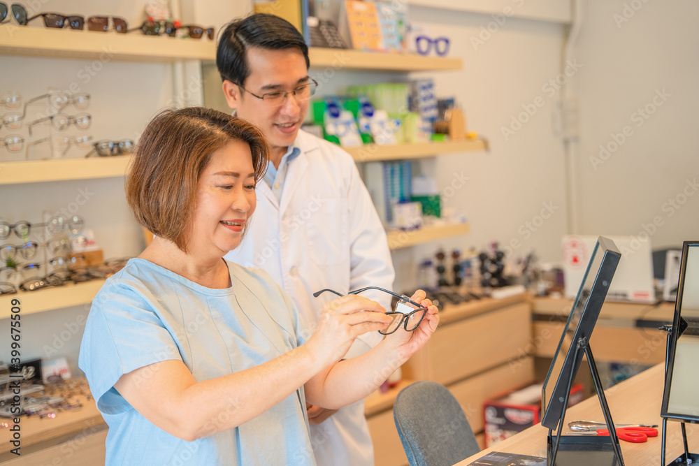 client choosing new eyeglasses frame for her new eyeglasses client choosing new eyeglasses frame for her new eyeglasses