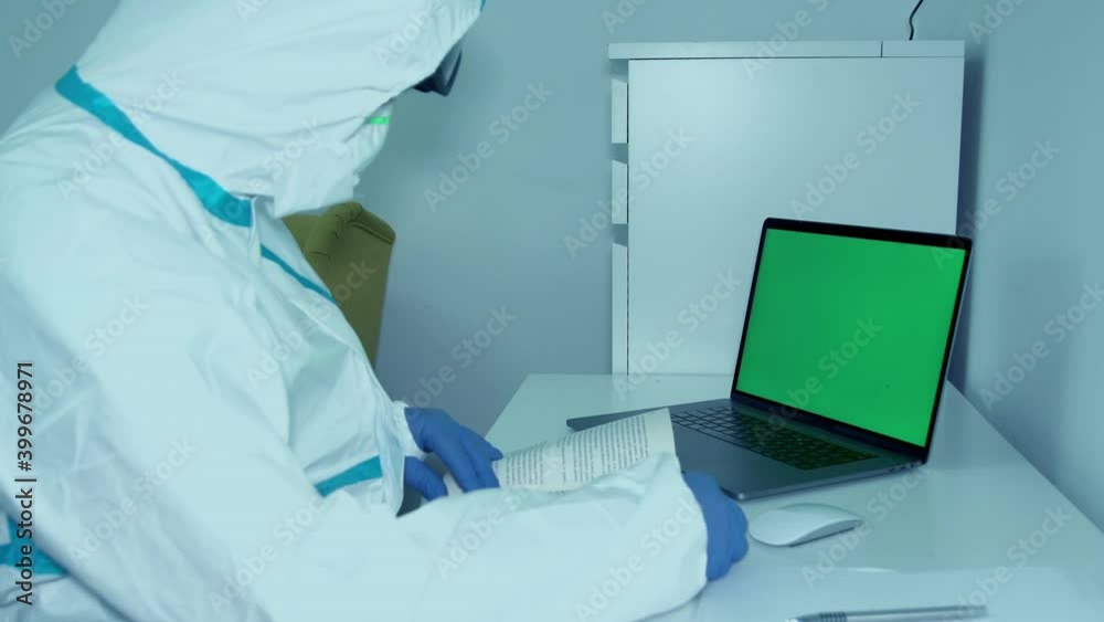 Medic In PPE Writing Down Notes About Medical Research During Pandemic - medium shot Medic In PPE Writing Down Notes About Medical Research During Pandemic - medium shot