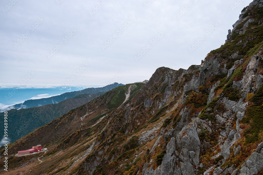 View of Senjojiki station and rocky terrain in early autumn at Senjojiki Cirque in Nagano Prefecture, Japan.