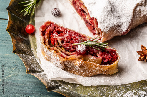 berry pie with cherries and cranberries, close up. Traditional Austrian cuisine photo