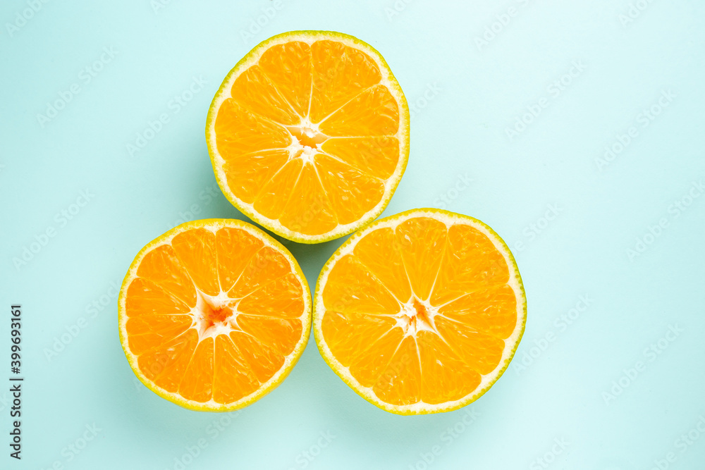 top view fresh tangerine slices on blue background photo color fruit orange citrus top view fresh tangerine slices on blue background photo color fruit orange citrus
