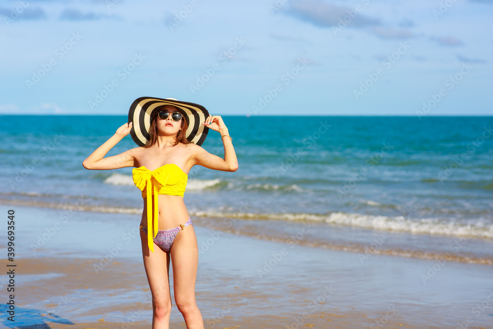 Sexy woman wear swimsuite on the beach. summer holiday concept Sexy woman wear swimsuite on the beach. summer holiday concept