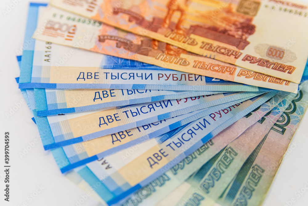 Currency russians rubles including new 5000 and 2000 rub in set. Isolated on white background Currency russians rubles including new 5000 and 2000 rub in set. Isolated on white background