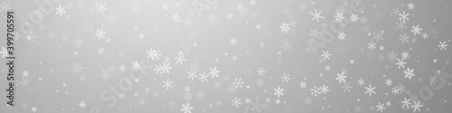 Sparse snowfall Christmas background. Subtle flyin