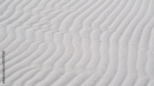 Closer look of the fine sand on the beach shore on a lowtide season in Estonia photo