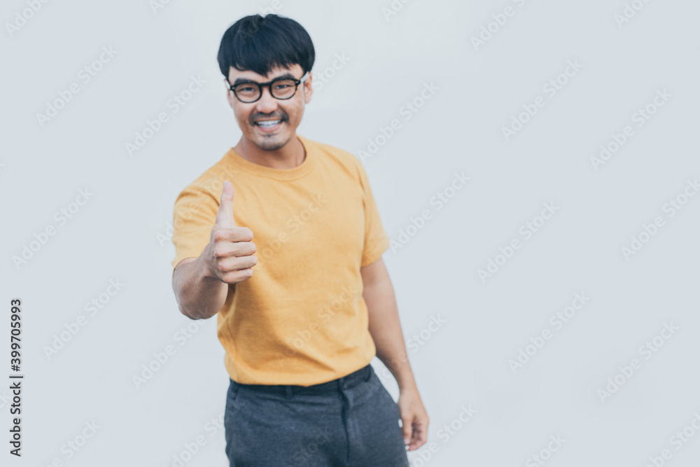 Naklejka premium adult asian man.young male wear eye glasses.posing smiling look excited surprised thinking positive happy joy life.empty,copy space for text advertising.white background.attractive fashion people