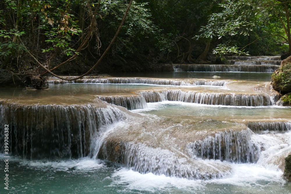 Obraz premium Photo picture of a fascinating view Thailand waterfall and the azure water with colors on the sun