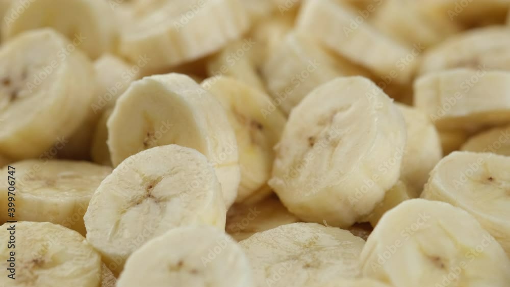 sliced banana close up rotate. pieces of the most popular banana fruit sliced banana close up rotate. pieces of the most popular banana fruit