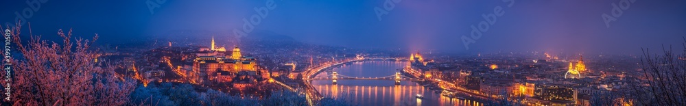 Panorama of Budapest at dusk overlooking Chain bridge and Parliament. Hungary