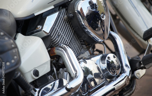 Motorcycle shiny metal pipes and engines