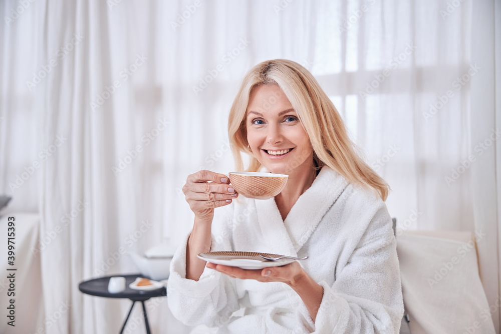 Good looking female having great time in the morning in spa resort hotel Good looking female having great time in the morning in spa resort hotel