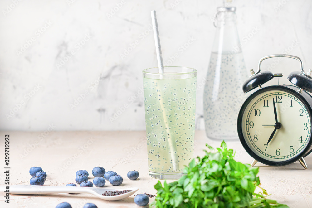 Refreshing morning drink with basil seeds. Light photography with