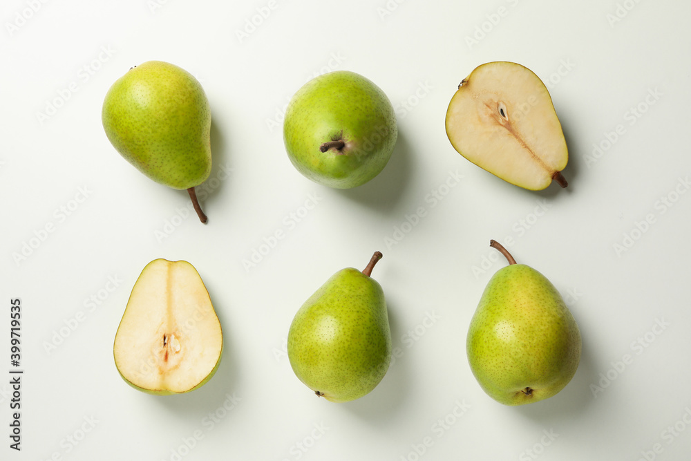 Fresh green pears on white background, top view Fresh green pears on white background, top view