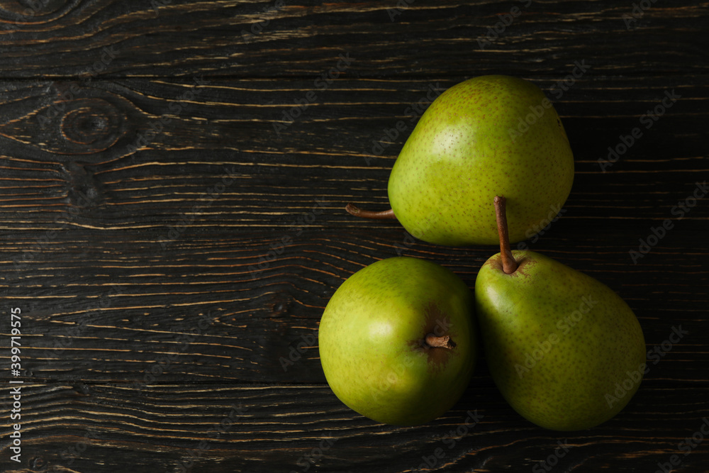 Fresh green pears on wooden background, space for text Fresh green pears on wooden background, space for text
