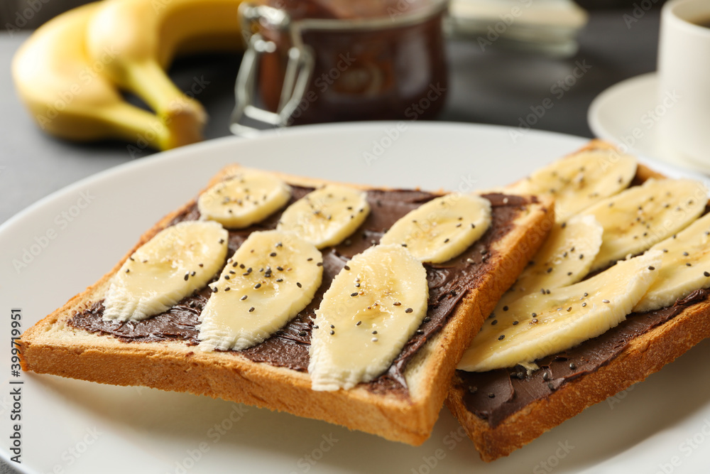 Concept of breakfast with toast with banana, close up