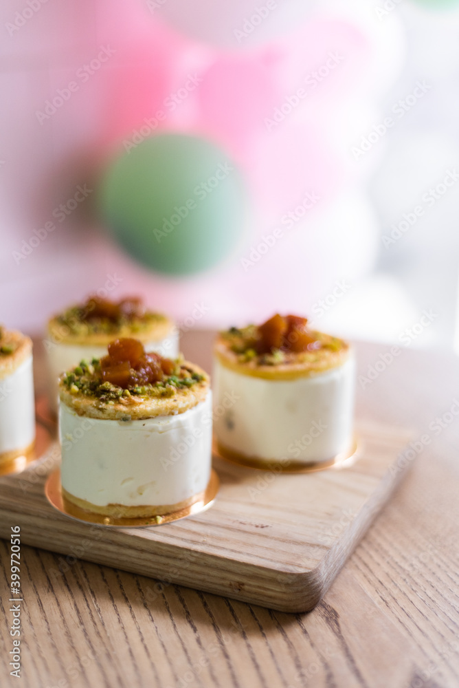 Delicious airy dessert mousse. Cake with berries. The treat is on a table in a cafe. Anna Pavlova Delicious airy dessert mousse. Cake with berries. The treat is on a table in a cafe. Anna Pavlova