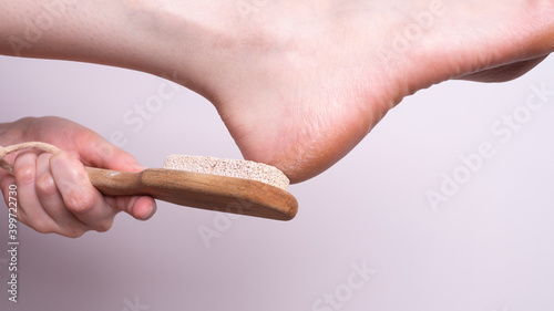 Woman taking care of her feet