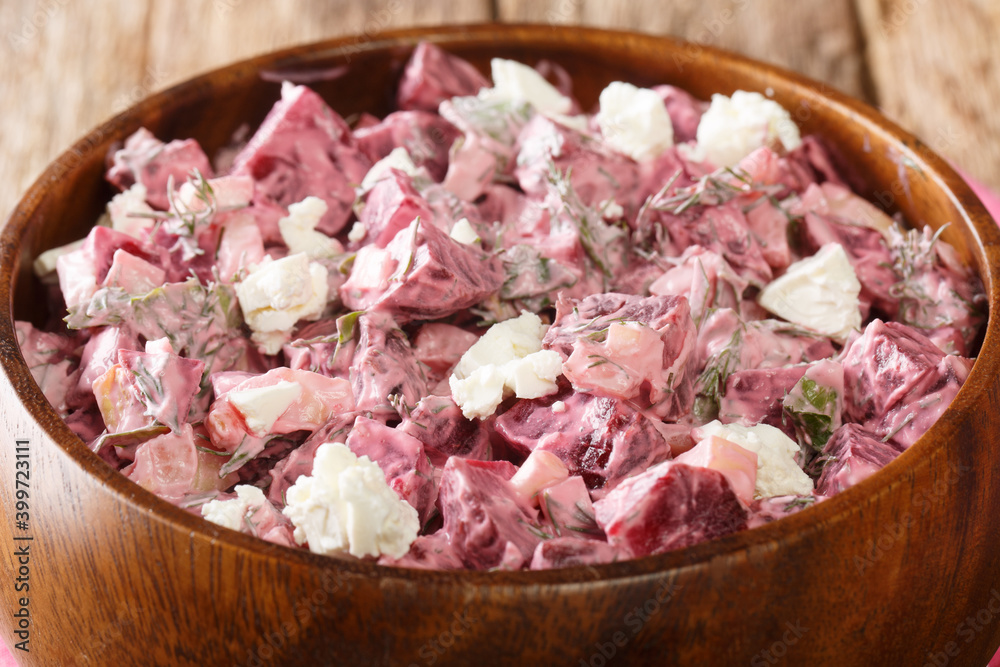 Pantzarosalata is a traditional Greek delicacy, that combines perfectly the superb taste of the Greek yogurt and the sweetness of the beetroots closeup in the bowl on the table. horizontal Pantzarosalata is a traditional Greek delicacy, that combines perfectly the superb taste of the Greek yogurt and the sweetness of the beetroots closeup in the bowl on the table. horizontal