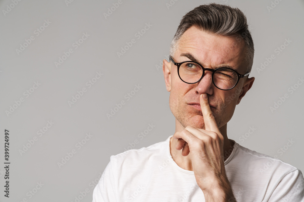 Portrait of a doubted pensive man thinking isolated Portrait of a doubted pensive man thinking isolated