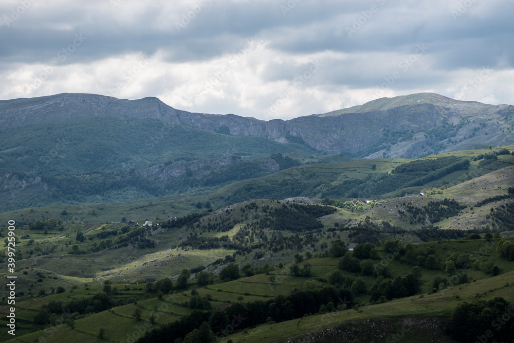 Mountain landscape against cloudy sky