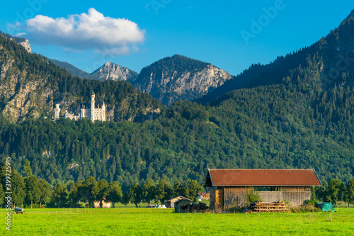 Tableau sur toile Scenic view of Schwangau with Neuschwanstein Castle and Tegelberg mountain peak
