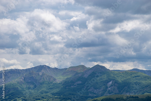Mountain landscape against cloudy sky