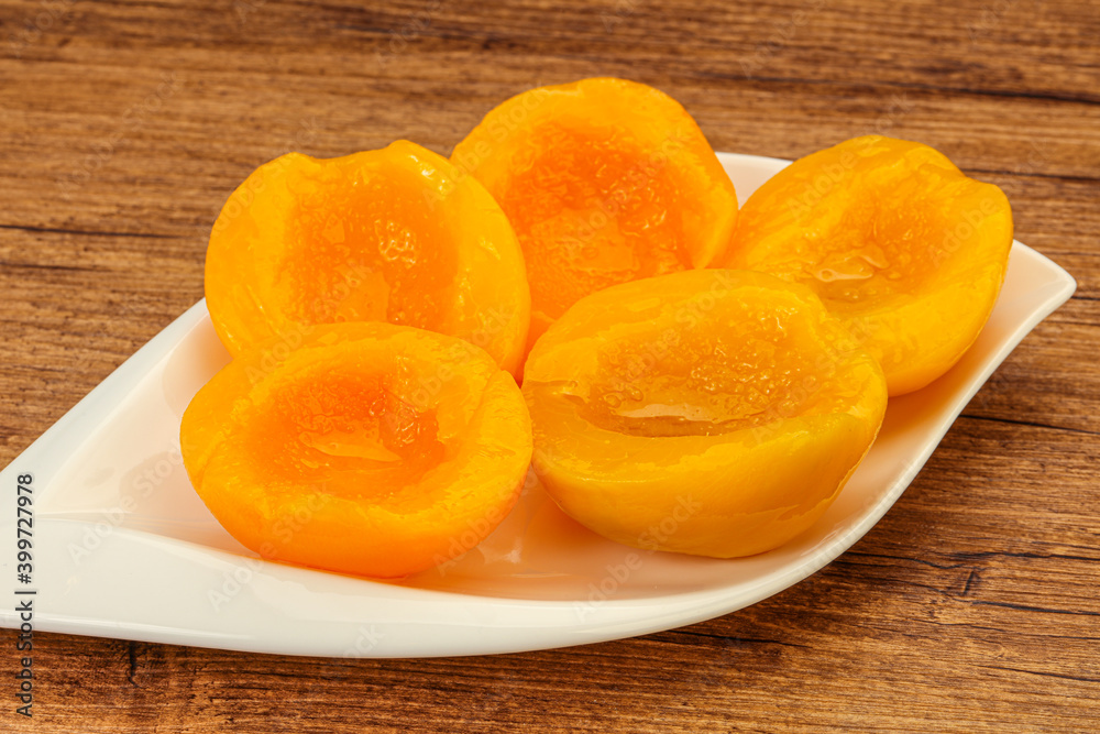 Marinated peaches fruit in the bowl Marinated peaches fruit in the bowl