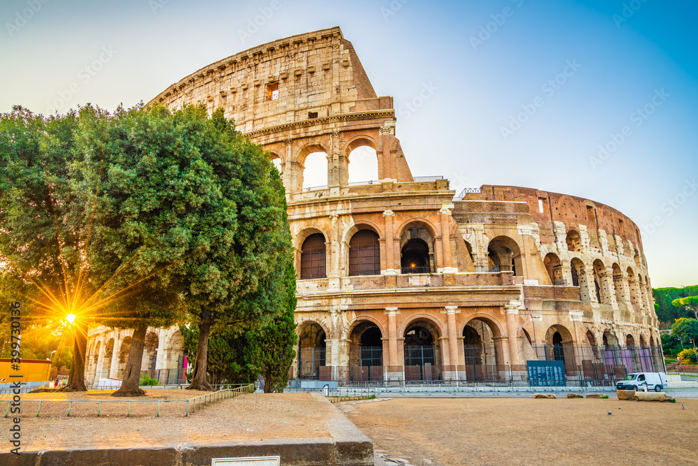 Colosseum in Rome and morning sun, Italy, Europe