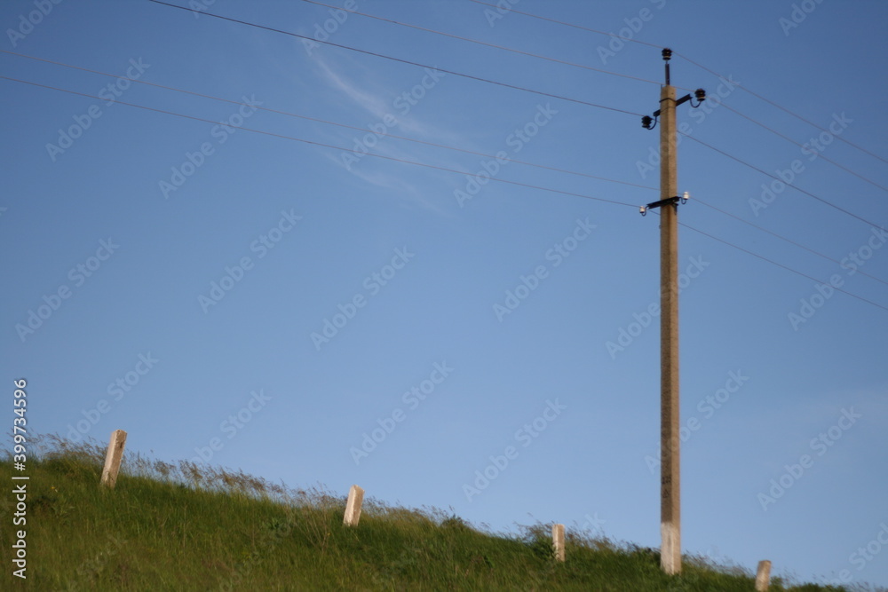 minimalist photo of power lines in the field