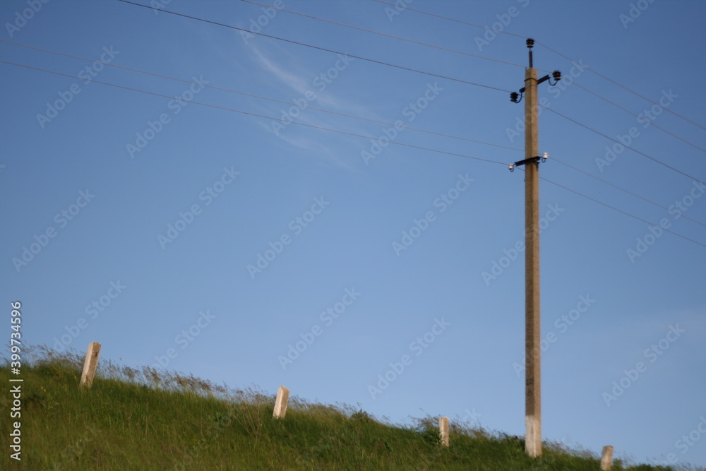 minimalist photo of power lines in the field minimalist photo of power lines in the field