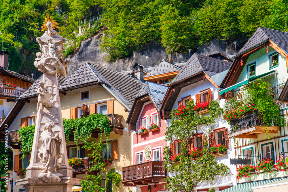 Architecture of Hallstatt mountain village in the Austrian Alps at beautiful light in summer, Salzkammergut region, Hallstatt, Austria Architecture of Hallstatt mountain village in the Austrian Alps at beautiful light in summer, Salzkammergut region, Hallstatt, Austria