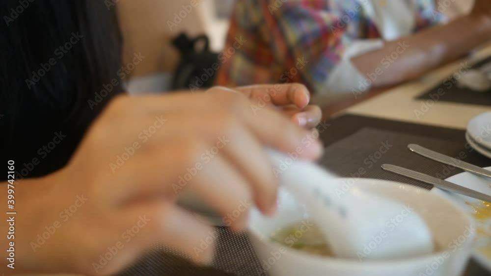 Friends eating food together, close up food on table Friends eating food together, close up food on table