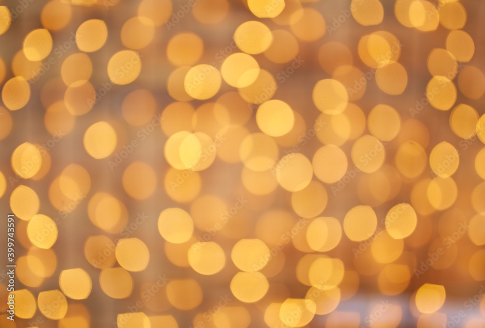 Fototapeta premium Golden beautiful blurred bokeh background with copy space.