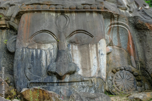 Sculptures carved into the rock at the archaeological site of Unakoti in the state of Tripura. India. photo