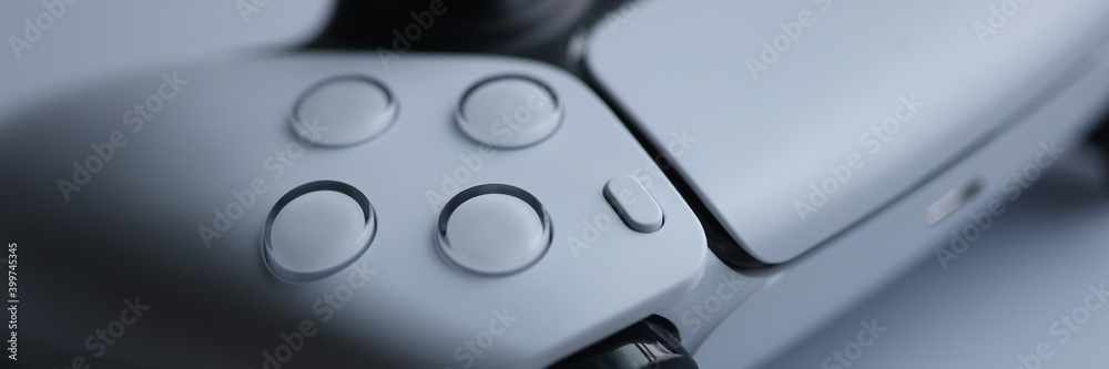 White modern game pad closeup background. Videogame cosole concept