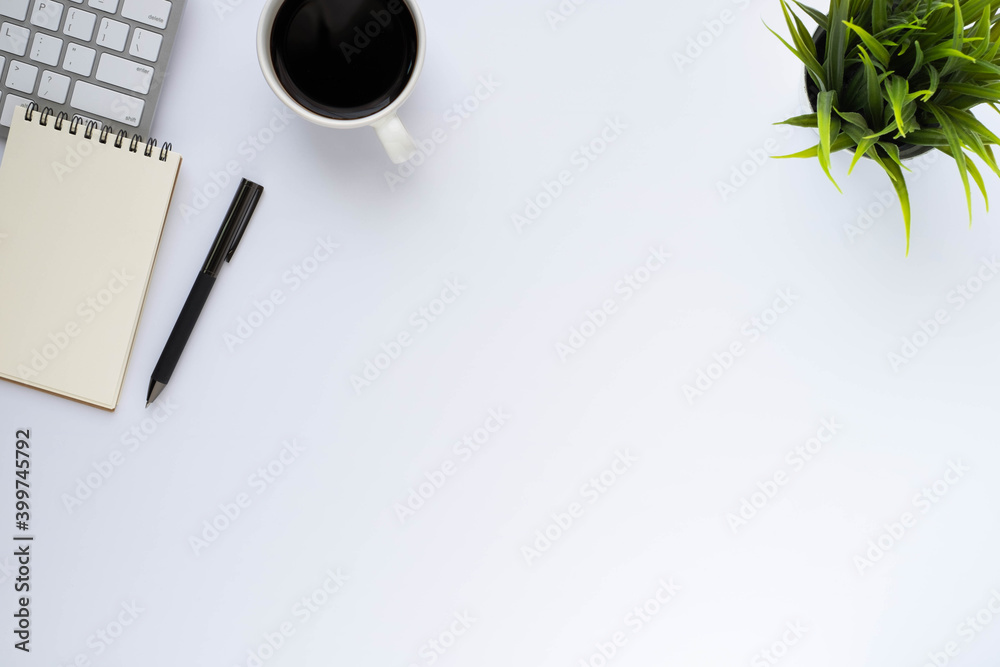 White office desk table with keyboard, notebook and coffee cup with equipment other office supplies. Business and finance concept. Workplace, Flat lay with blank copy space. Top view - obrazy, fototapety, plakaty 