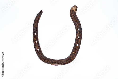 Metal horseshoe on white background,symbol of good luck.